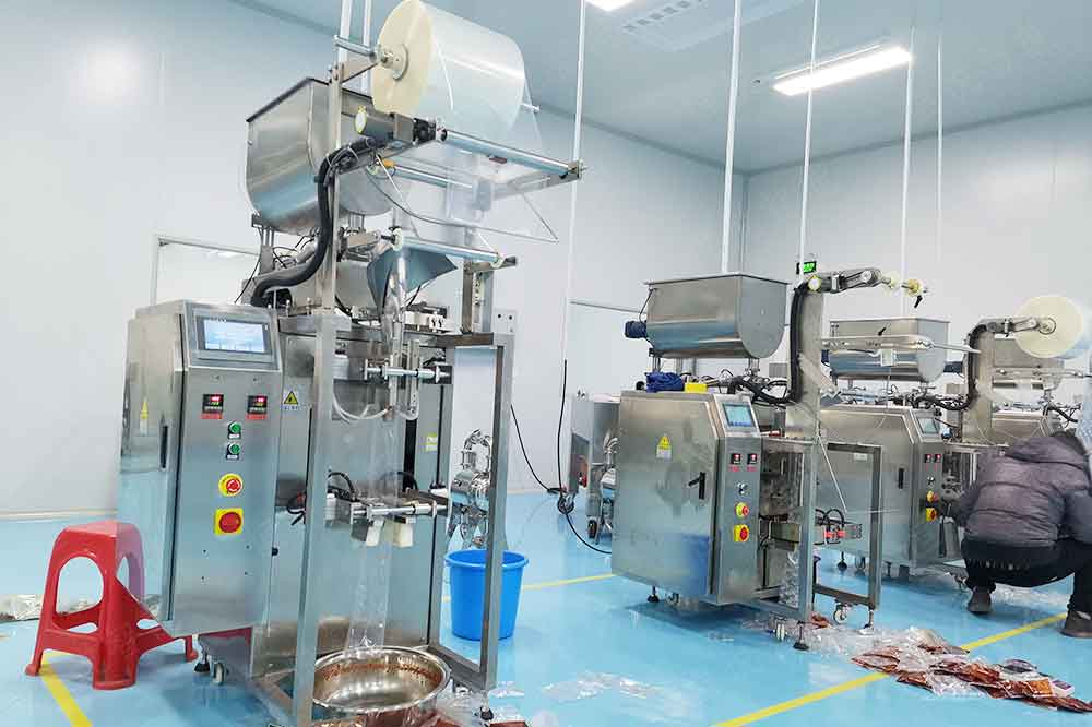 全自動(dòng)火鍋底料包裝機(jī)用于火鍋料、豆瓣醬、辣椒醬等等產(chǎn)品包裝
